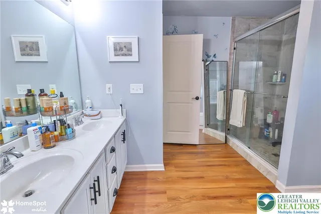 a dining room with furniture and a lamp