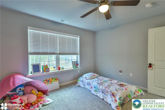 a bathroom with a sink a vanity and a mirror