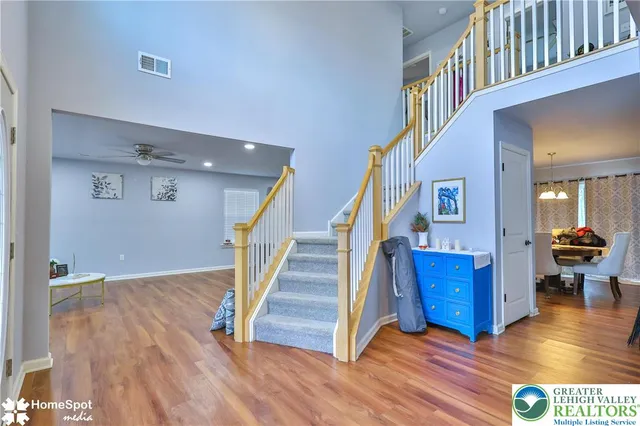 a view of entryway with wooden floor