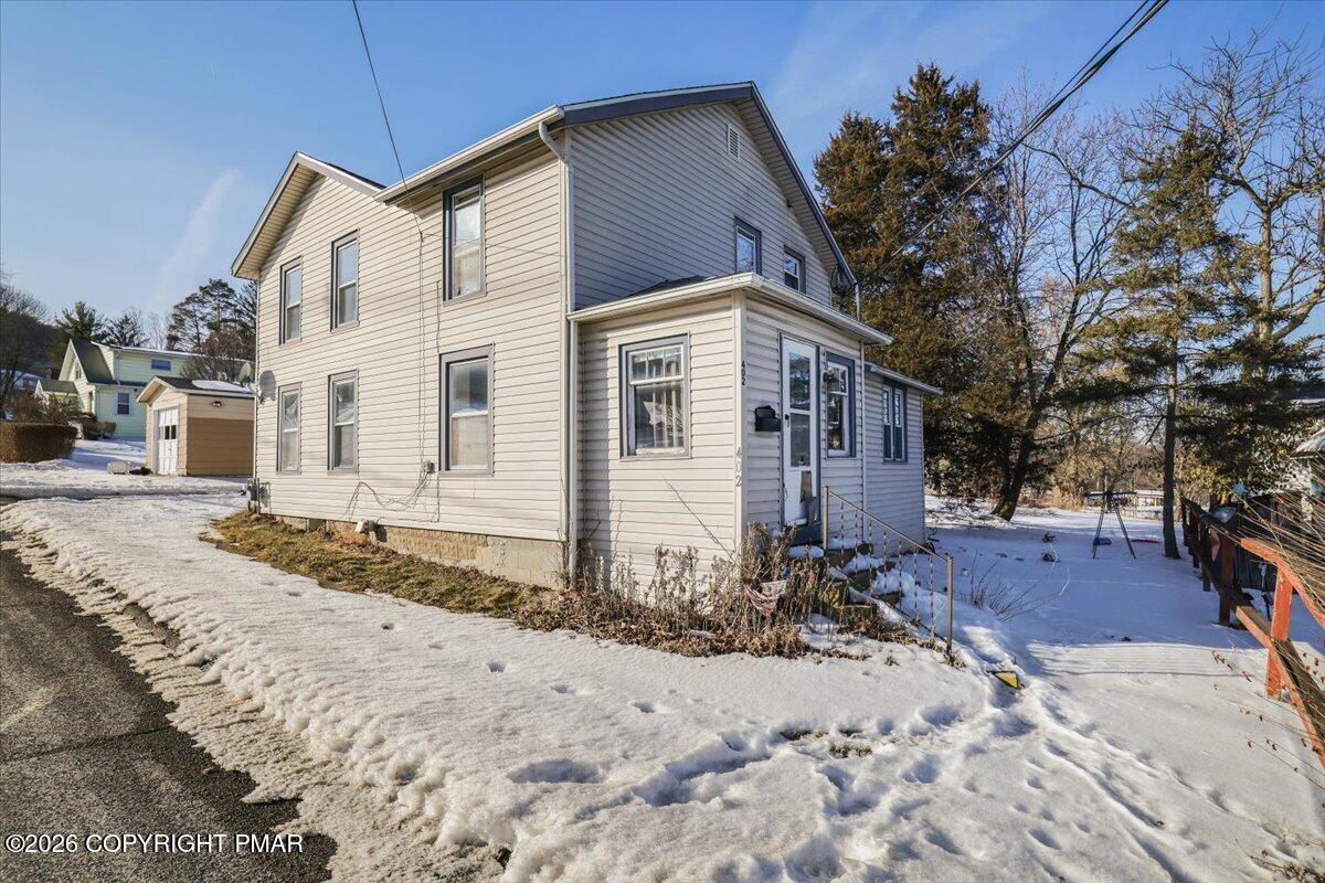 402 Elizabeth Street Towanda, PA 18848 - Photo 1 of 30 a front view of a house with a yard