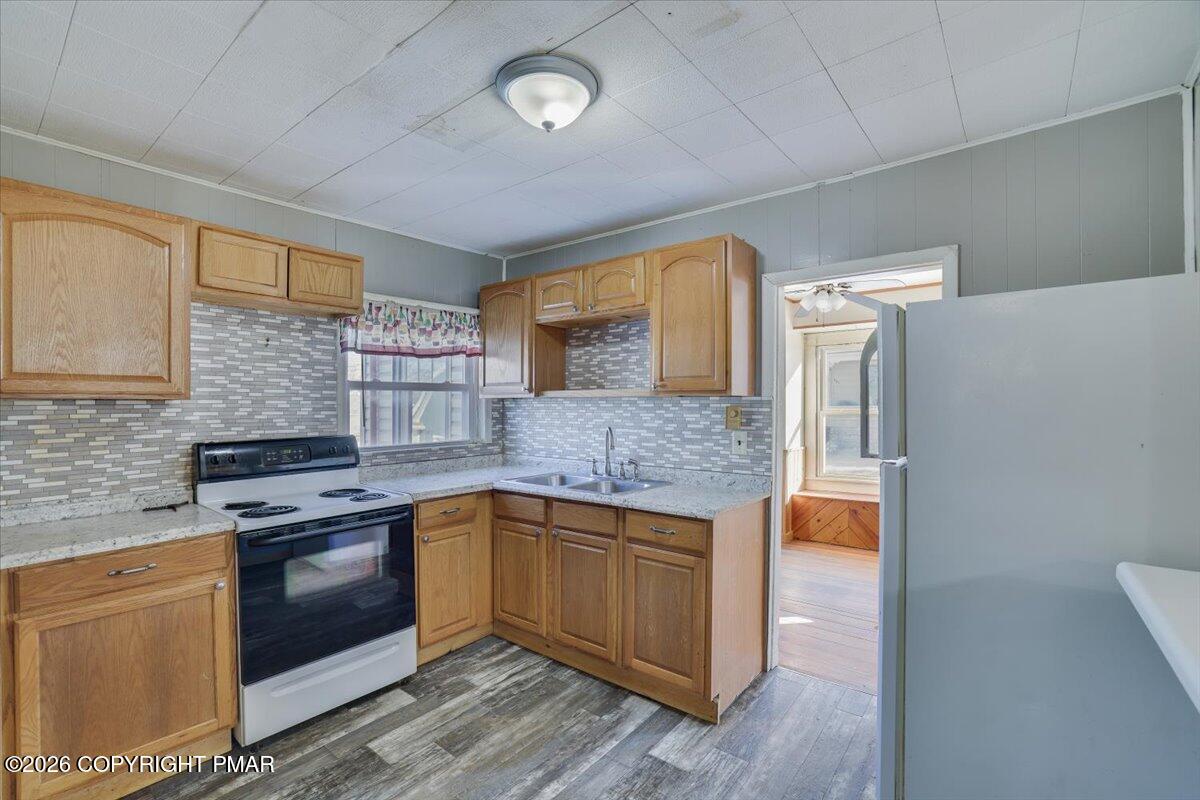402 Elizabeth Street Towanda, PA 18848 - Photo 11 of 30 a kitchen with stainless steel appliances granite countertop a stove and a sink