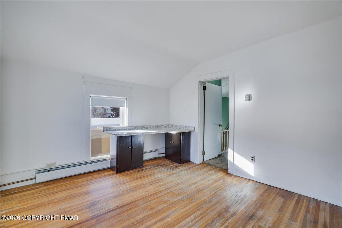 402 Elizabeth Street Towanda, PA 18848 - Photo 18 of 30 a view of a kitchen with wooden floor and a window