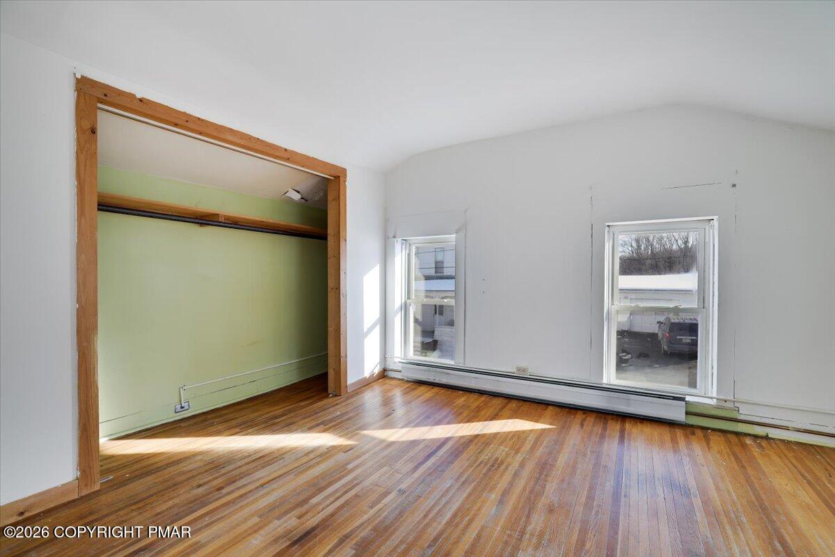 402 Elizabeth Street Towanda, PA 18848 - Photo 19 of 30 an empty room with wooden floor and windows
