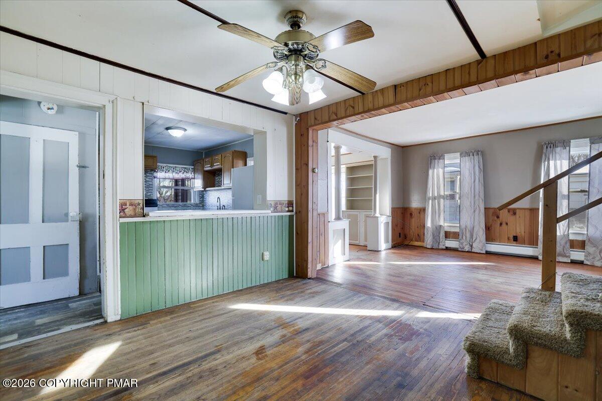 402 Elizabeth Street Towanda, PA 18848 - Photo 5 of 30 a view of a livingroom with furniture a dinning room and chandelier fan