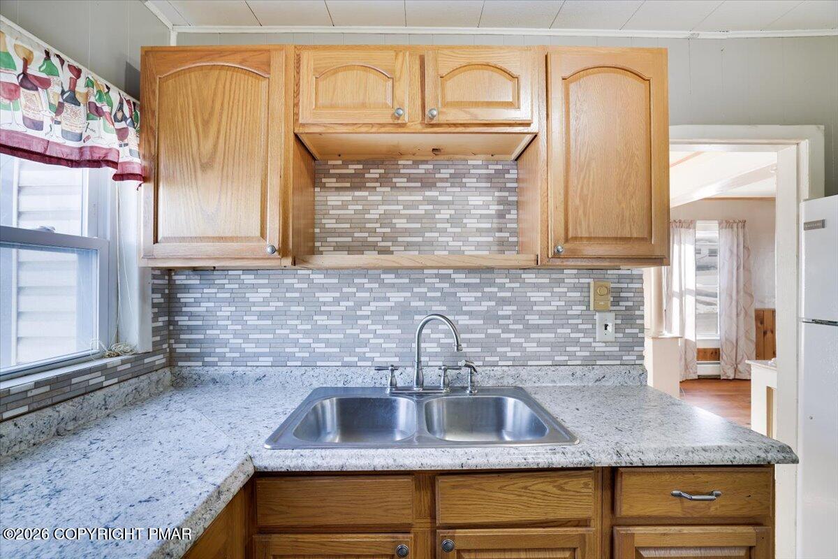 402 Elizabeth Street Towanda, PA 18848 - Photo 10 of 30 a kitchen with granite countertop a sink stainless steel appliances and cabinets