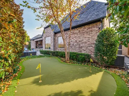 a view of a patio with swimming pool