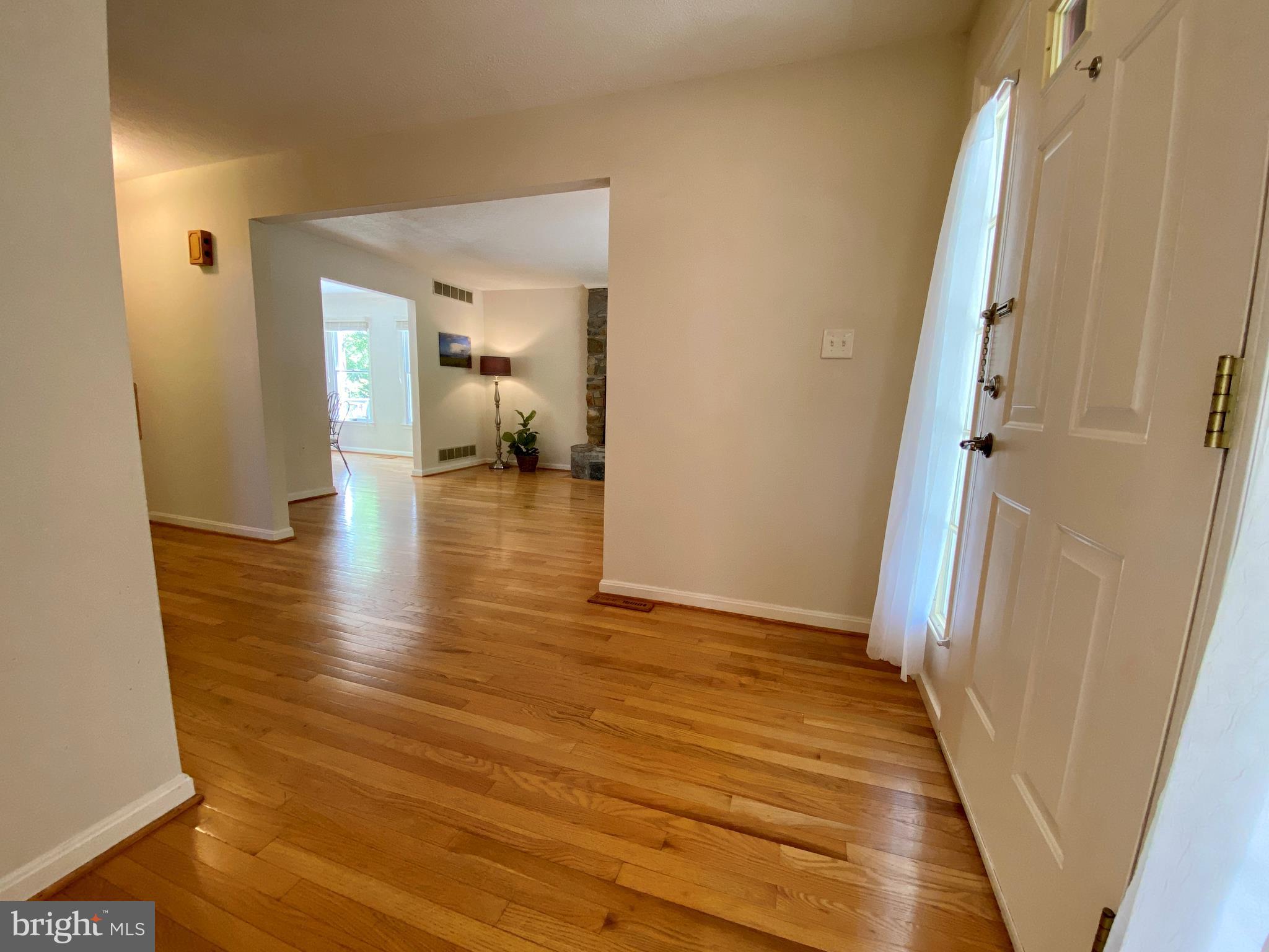 6799 Howellsville Road Boyce, VA 22620 - Photo 17 of 53 View from Powder Room to Foyer and Family Room