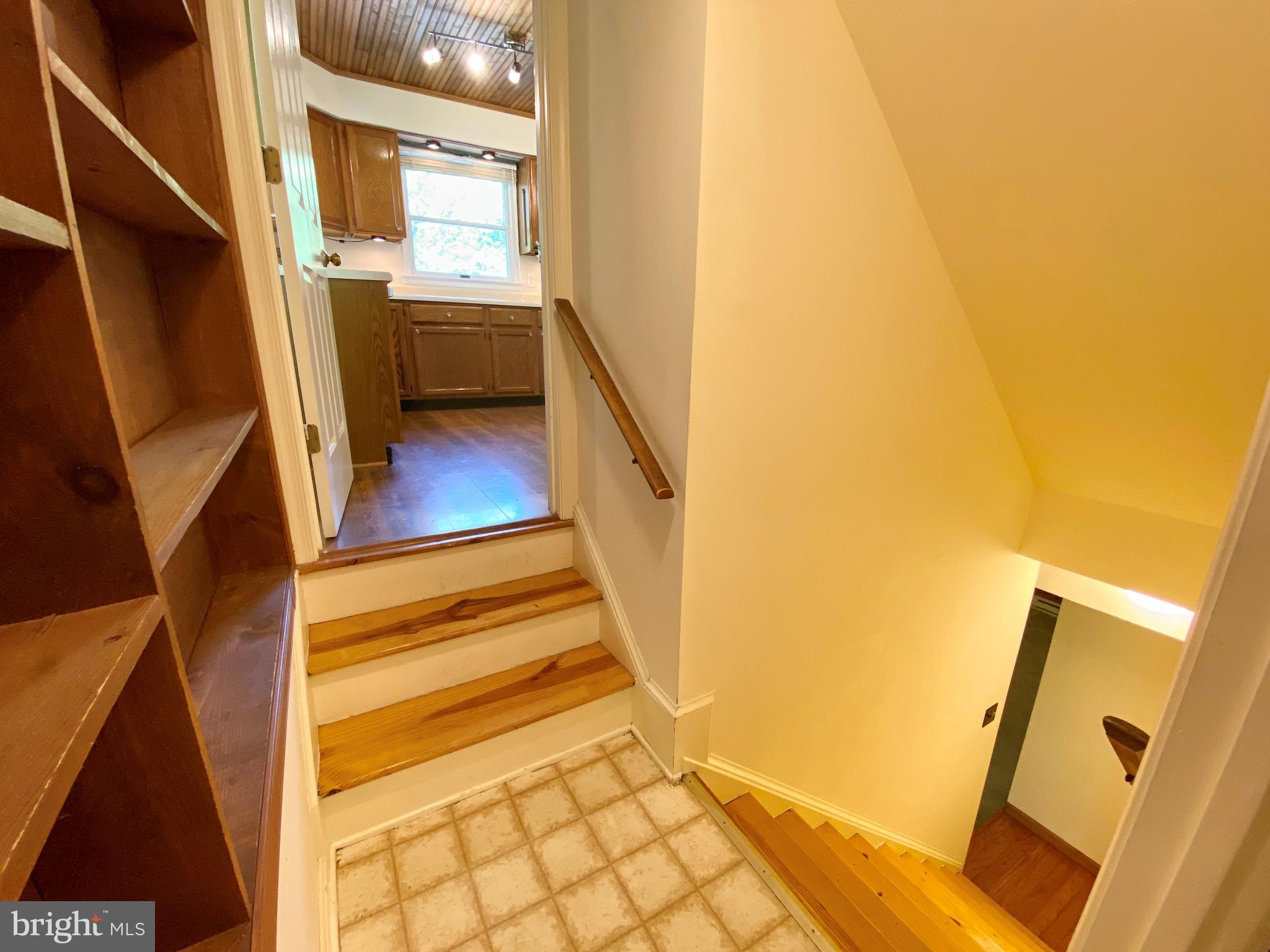 6799 Howellsville Road Boyce, VA 22620 - Photo 20 of 53 Basement Stairway Off Kitchen and Laundry Room