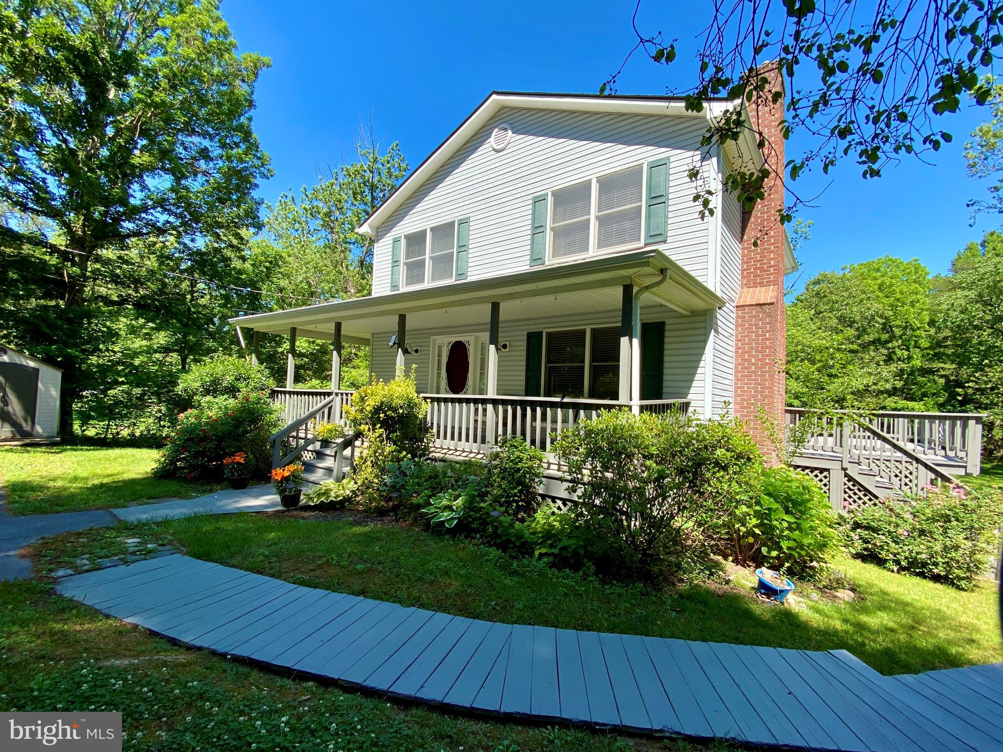 6799 Howellsville Road Boyce, VA 22620 - Photo 37 of 53 Front of Home with Landscaping and Walkway