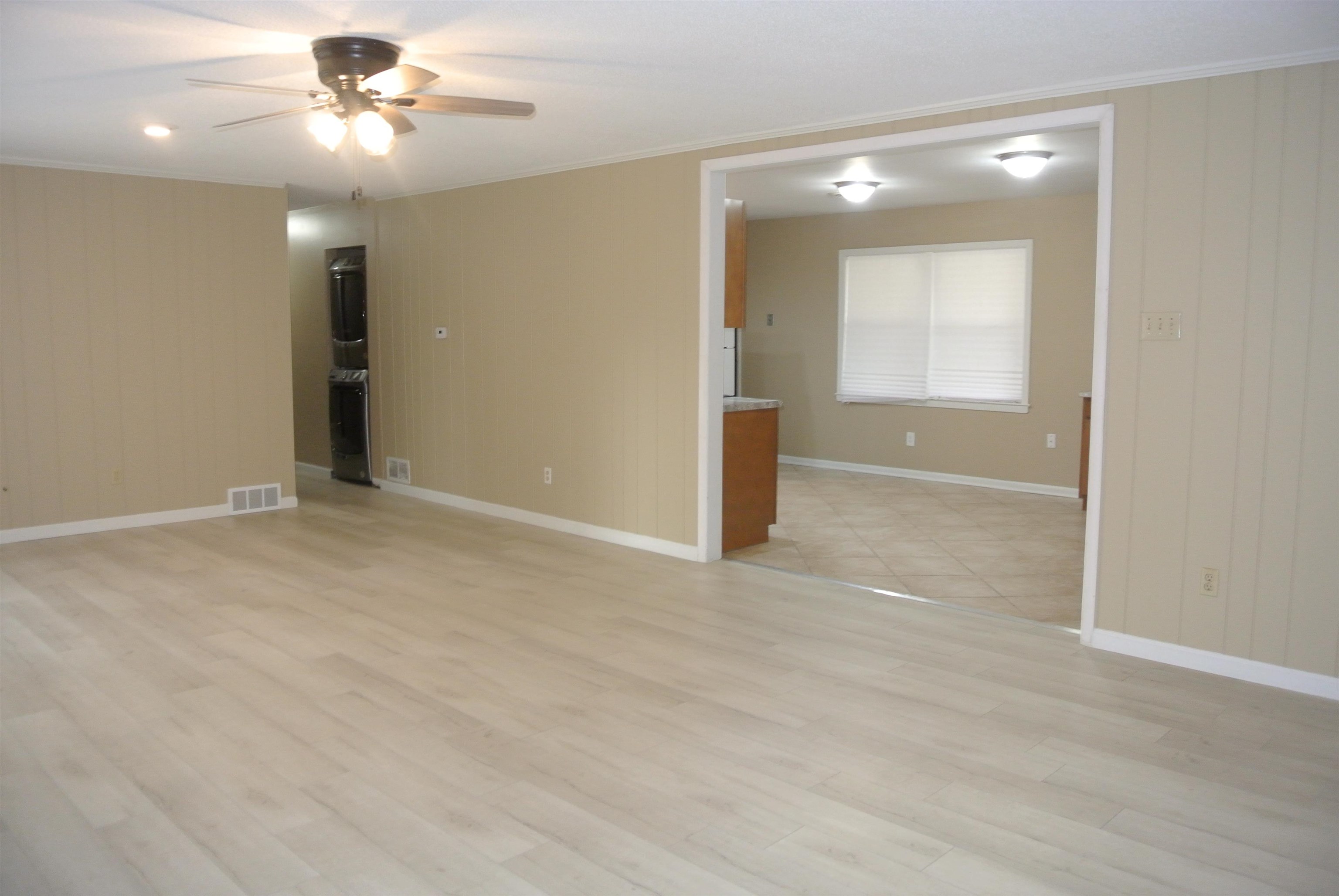 426 Cardinal Drive Collierville, TN 38017 - Photo 10 of 21 an empty room with closet and a chandelier fan