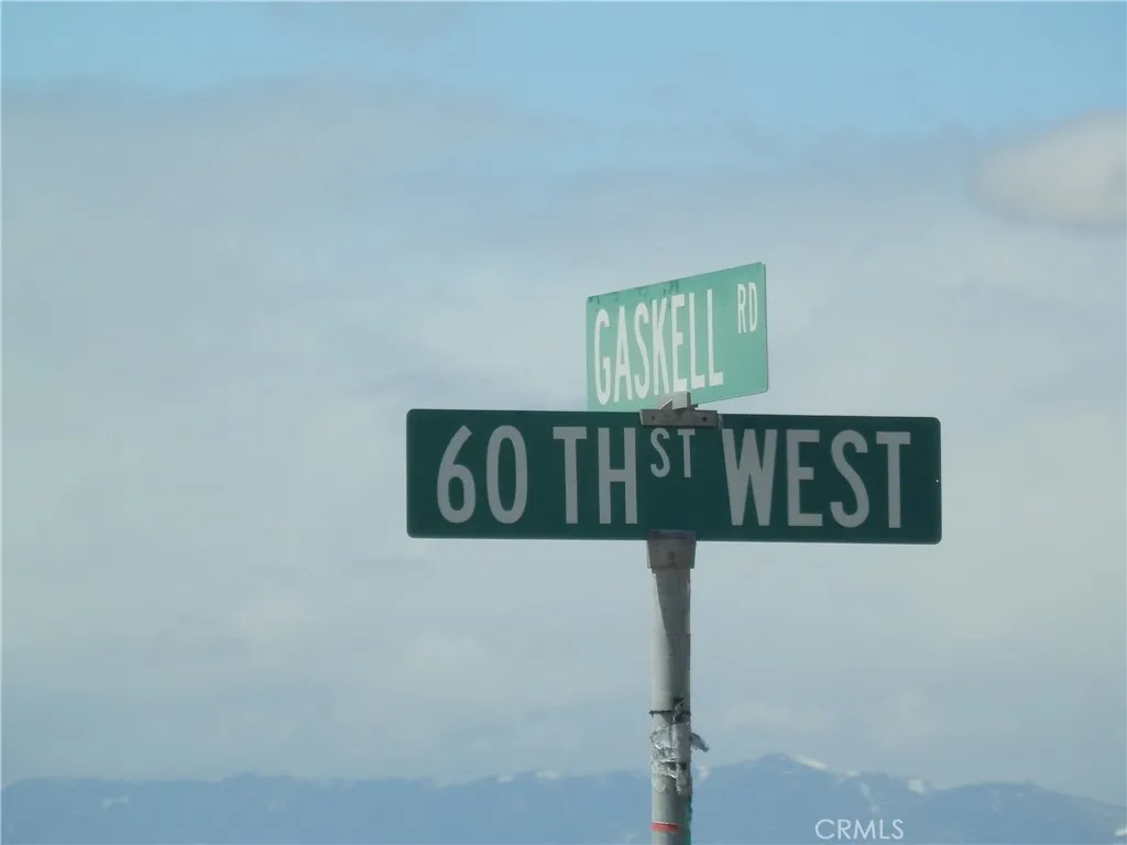 0 Gaskell Road Rosamond, CA 93560 - Photo 17 of 20 a street sign sitting on a wall