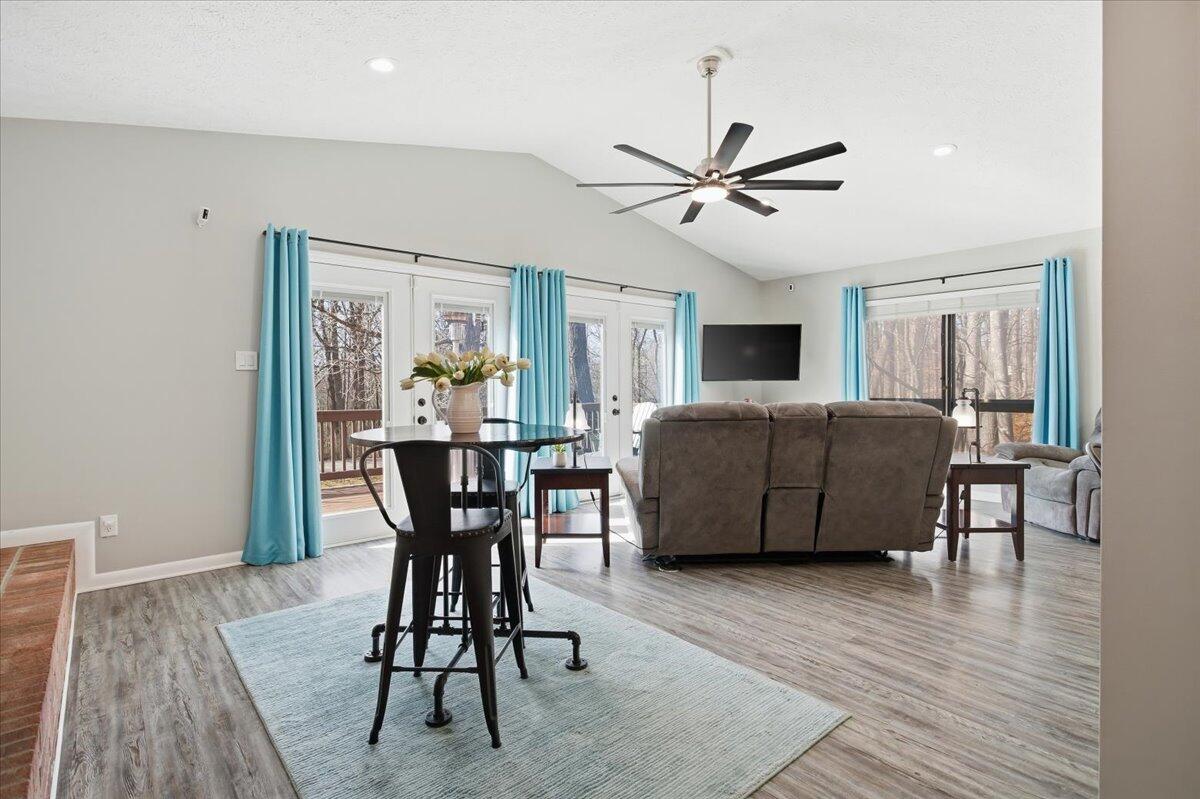 128 Huntington Road Ridgeway, VA 24148 - Photo 11 of 60 a view of a livingroom with furniture a table and wooden floor