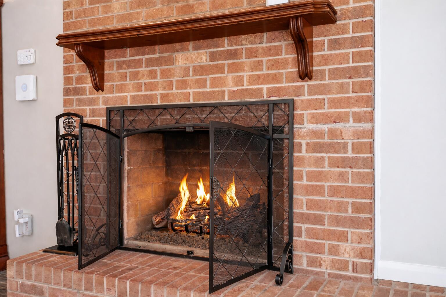 128 Huntington Road Ridgeway, VA 24148 - Photo 12 of 60 a view of a fireplace with wooden door