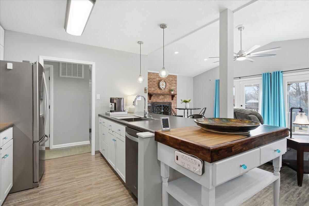 128 Huntington Road Ridgeway, VA 24148 - Photo 24 of 60 a kitchen with stainless steel appliances granite countertop a stove and a refrigerator