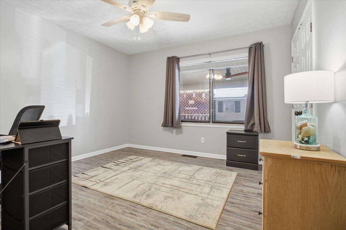 128 Huntington Road Ridgeway, VA 24148 - Photo 28 of 60 a bedroom with a bed and a window