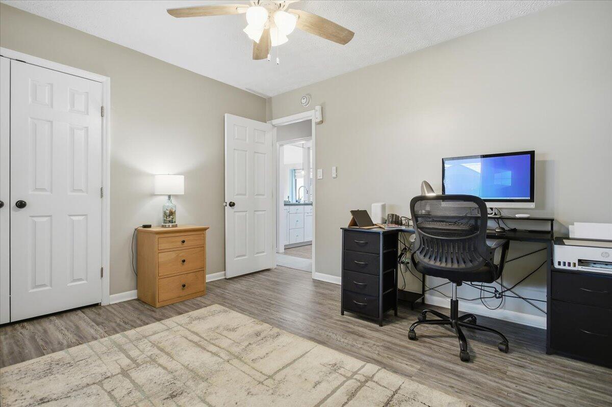128 Huntington Road Ridgeway, VA 24148 - Photo 29 of 60 a view of a workspace with furniture and a dresser