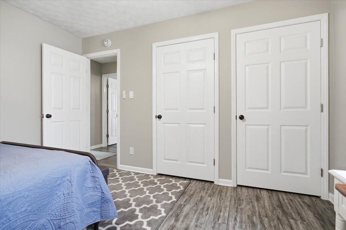 128 Huntington Road Ridgeway, VA 24148 - Photo 34 of 60 an empty room with wooden floor and closet area