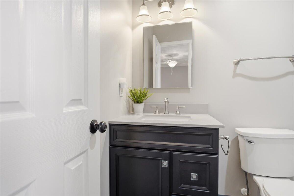 128 Huntington Road Ridgeway, VA 24148 - Photo 38 of 60 a bathroom with a sink vanity and toilet