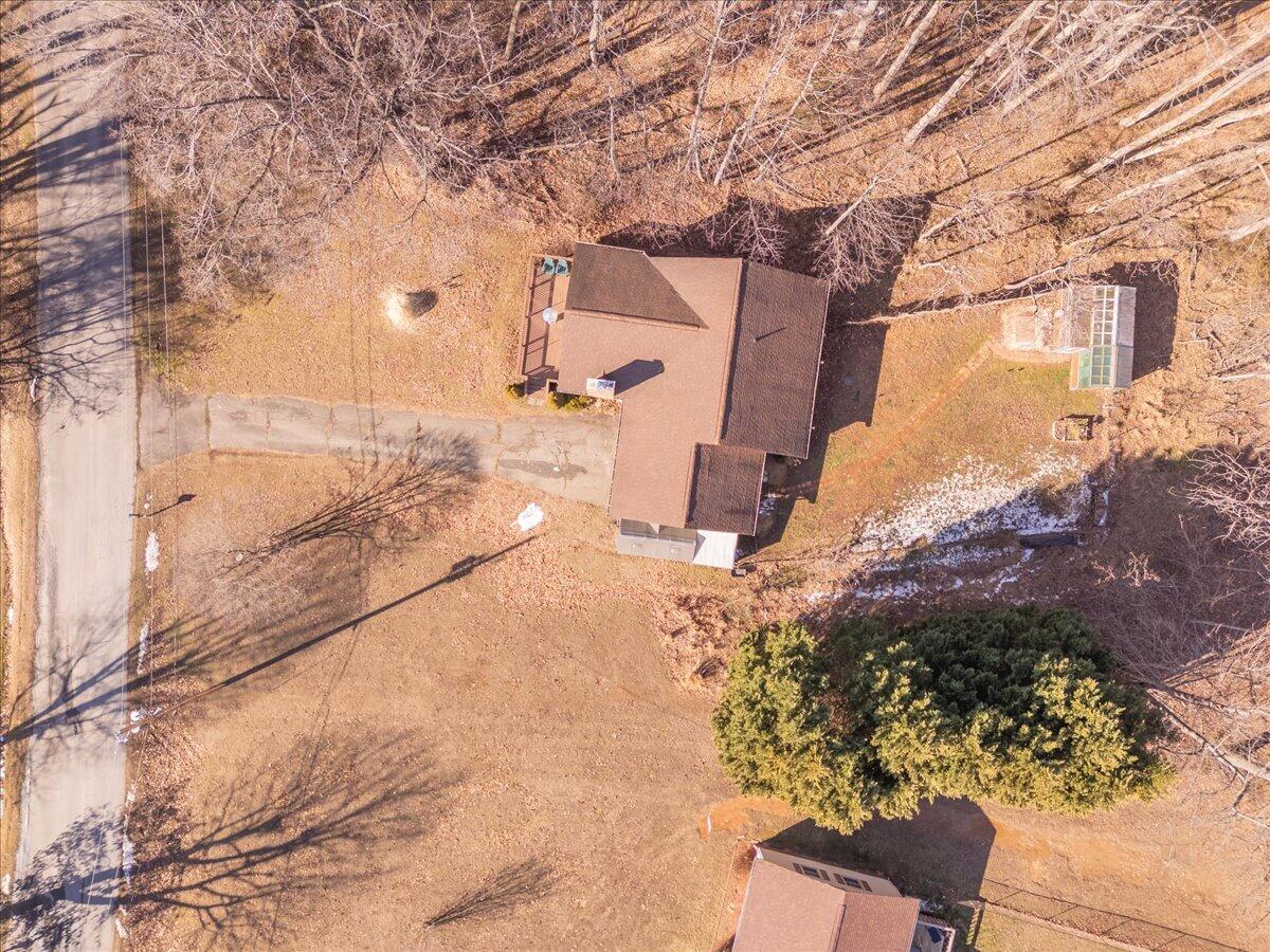128 Huntington Road Ridgeway, VA 24148 - Photo 51 of 60 a view of a backyard of the house