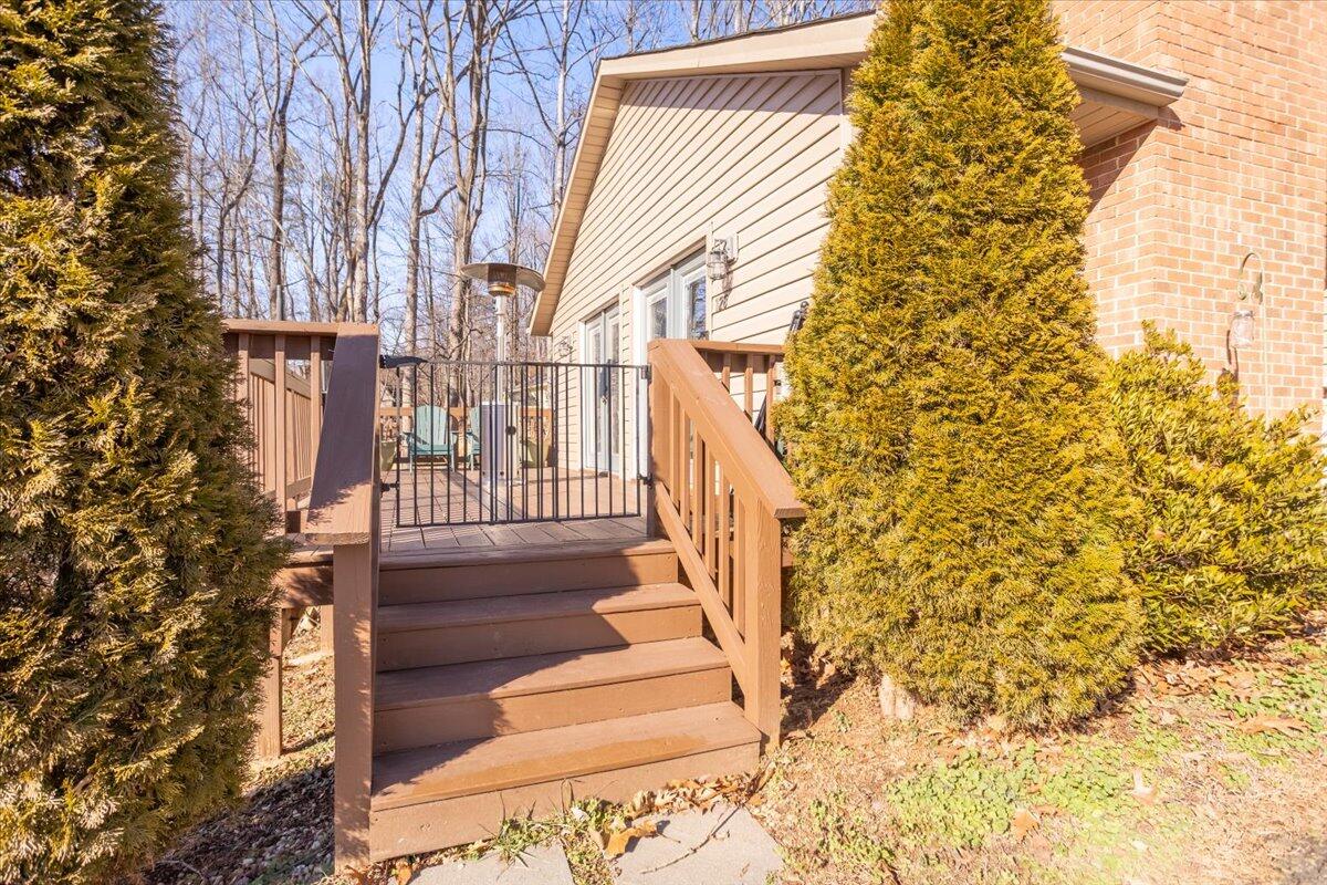 128 Huntington Road Ridgeway, VA 24148 - Photo 6 of 60 a view of entryway with wooden floor