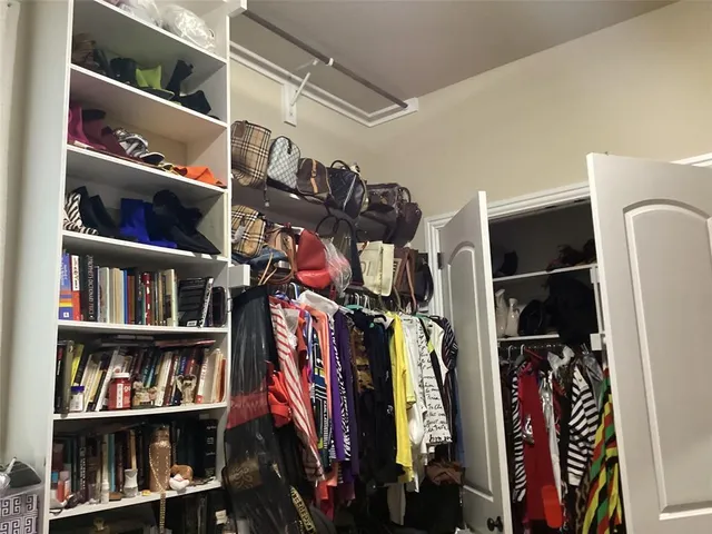 a view of a livingroom with furniture and windows