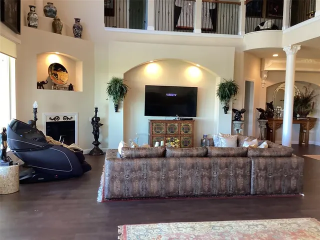 a kitchen with a refrigerator and a stove