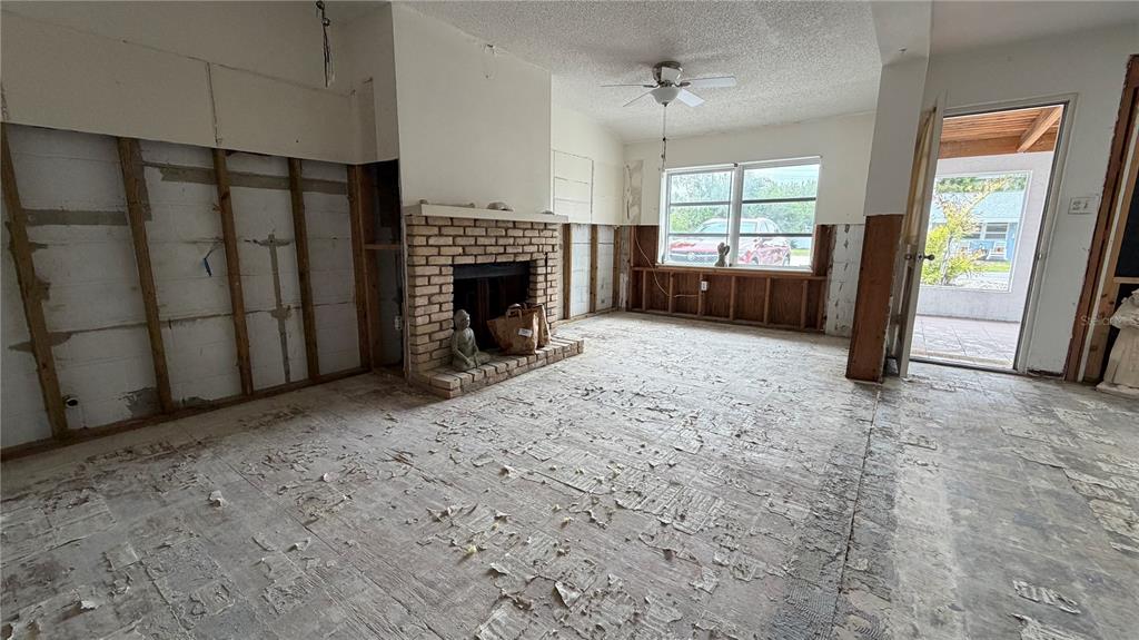 114 78th Street Holmes Beach, FL 34217 - Photo 18 of 25 a view of a livingroom with a fireplace
