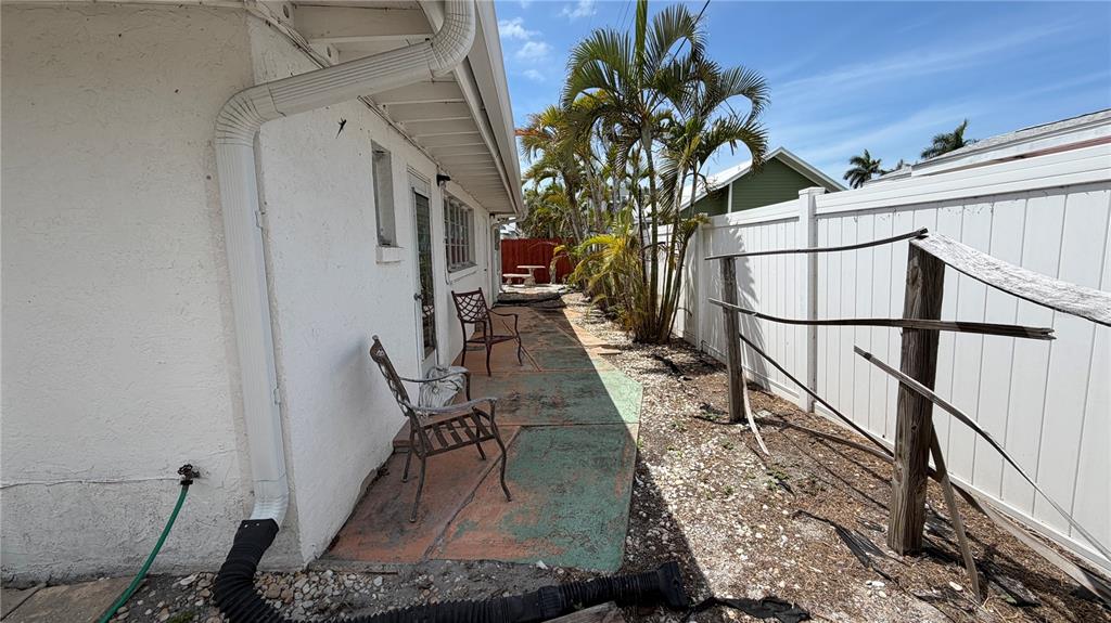 114 78th Street Holmes Beach, FL 34217 - Photo 24 of 25 a view of a house with backyard