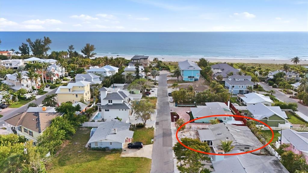 114 78th Street Holmes Beach, FL 34217 - Photo 4 of 25 an aerial view of residential houses with outdoor space