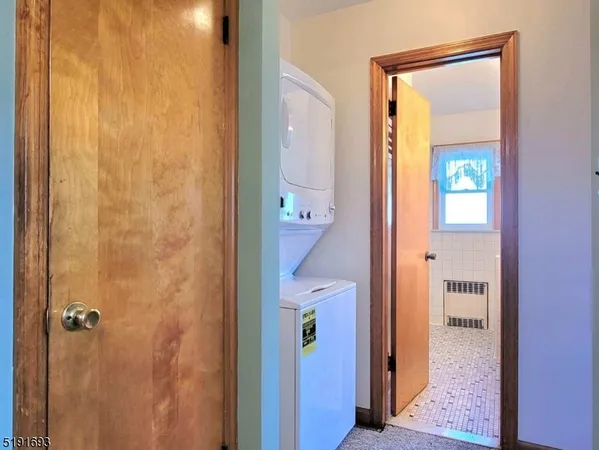 a view of a bathroom from a hallway