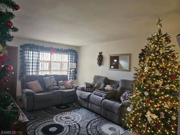 a living room with furniture and decor