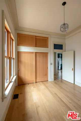 a view of an empty room with a window