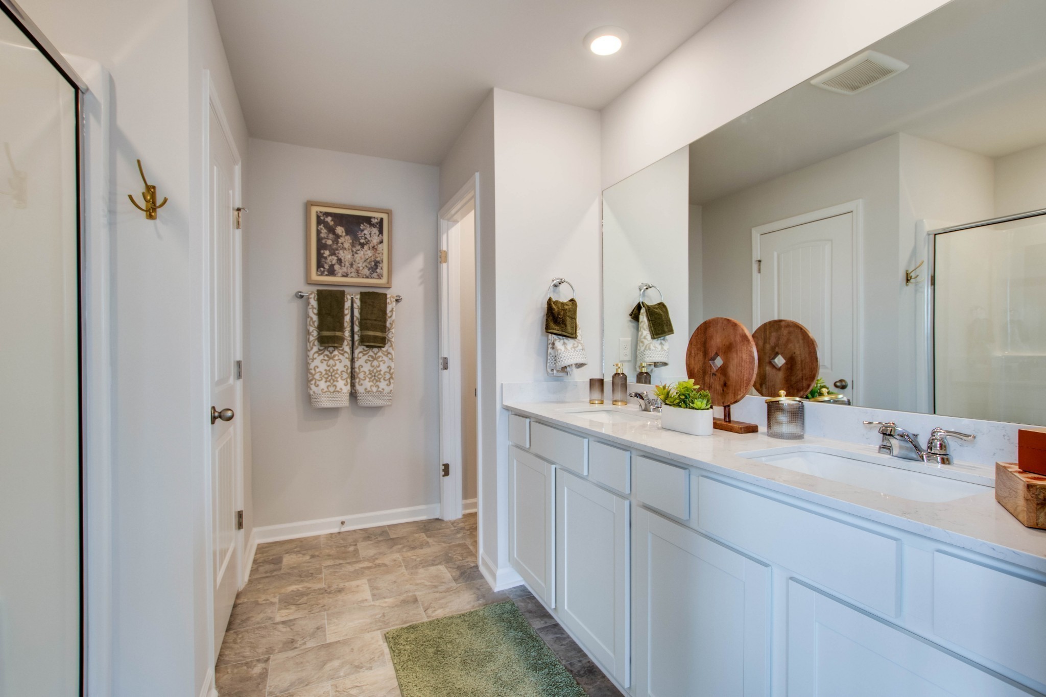 258 Hazel Lane Lebanon, TN 37087 - Photo 18 of 37 a bathroom with a sink and a mirror