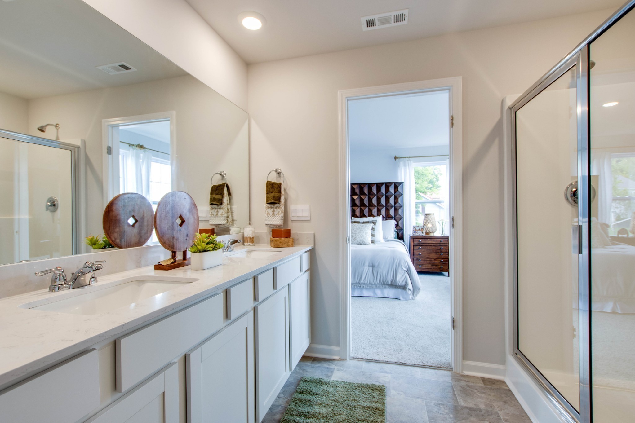 258 Hazel Lane Lebanon, TN 37087 - Photo 19 of 37 a en suite bathroom with a granite countertop sink mirror and shower