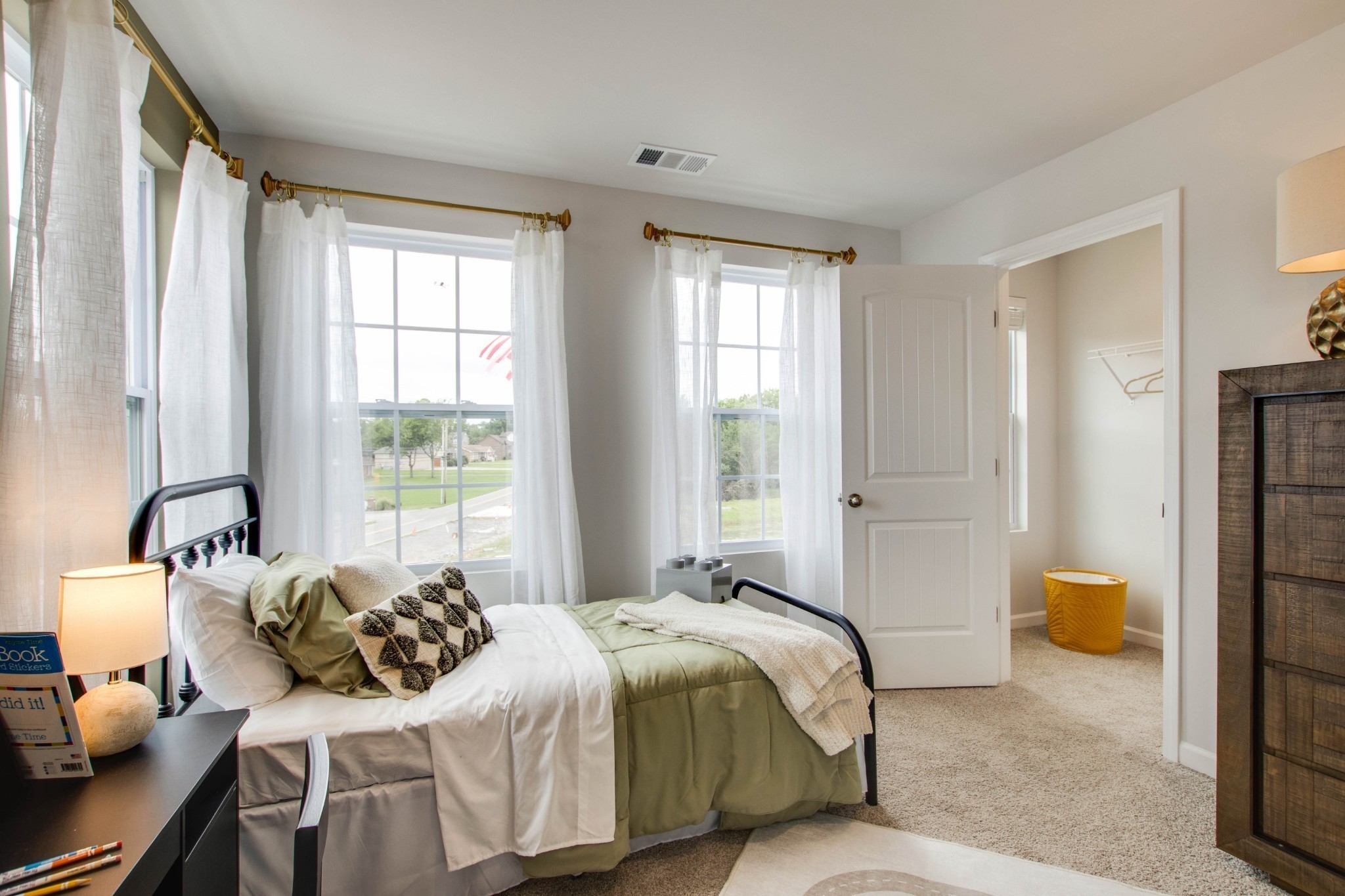 258 Hazel Lane Lebanon, TN 37087 - Photo 23 of 37 a bedroom with a bed and wooden floor