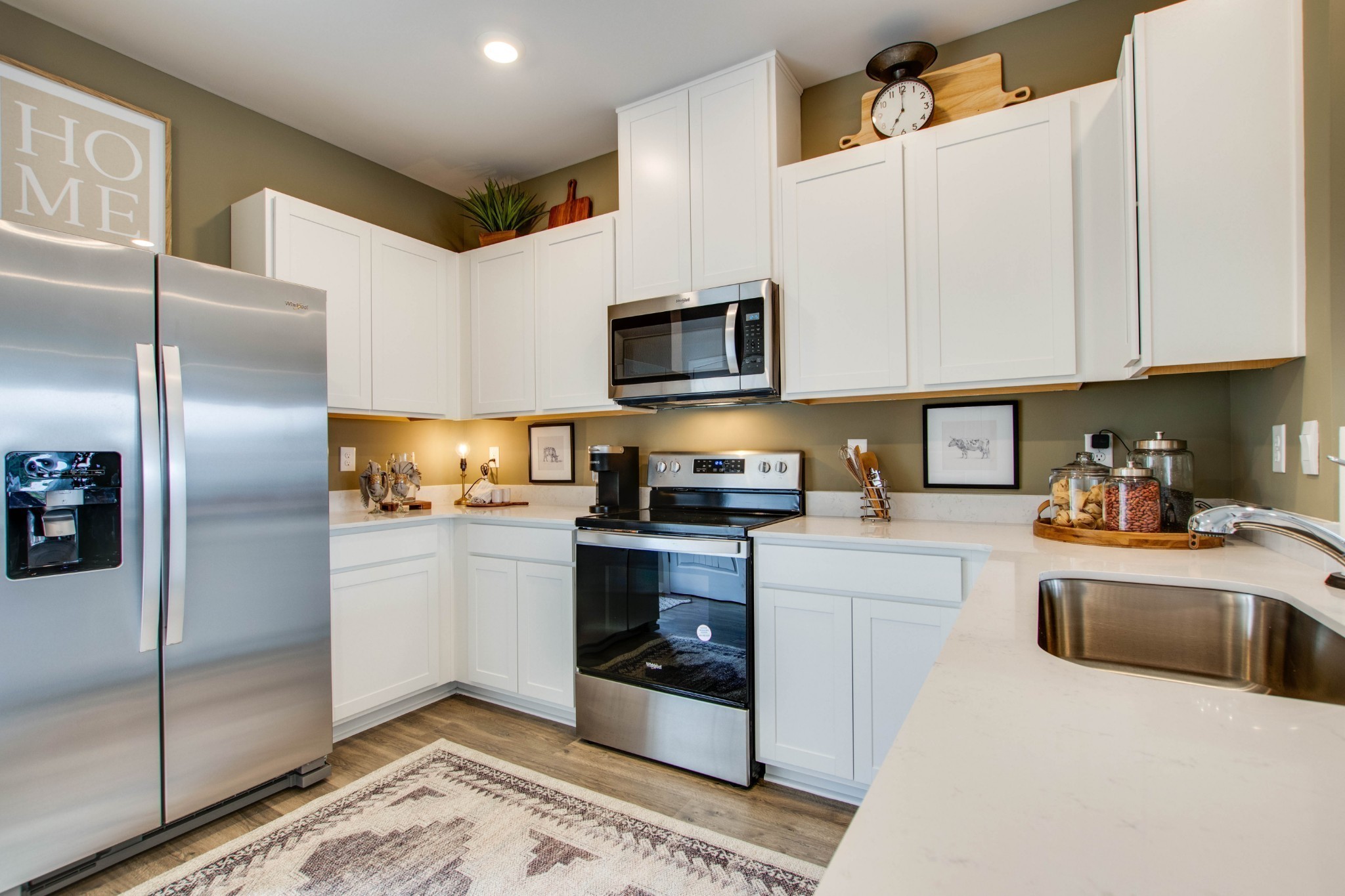 258 Hazel Lane Lebanon, TN 37087 - Photo 7 of 37 a kitchen with stainless steel appliances granite countertop a refrigerator a stove and a sink