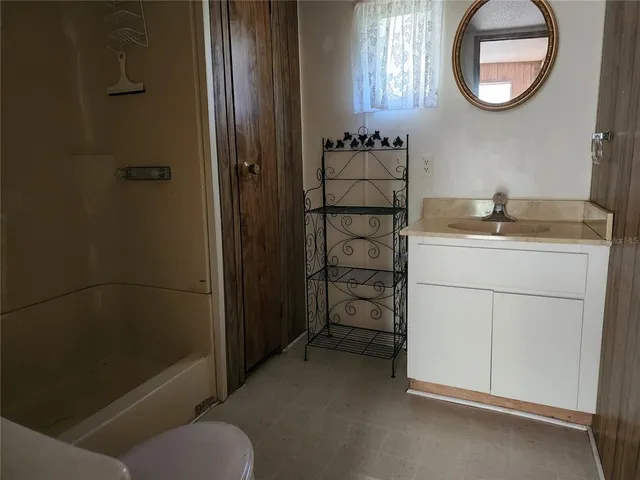 a view of a yard with tree s