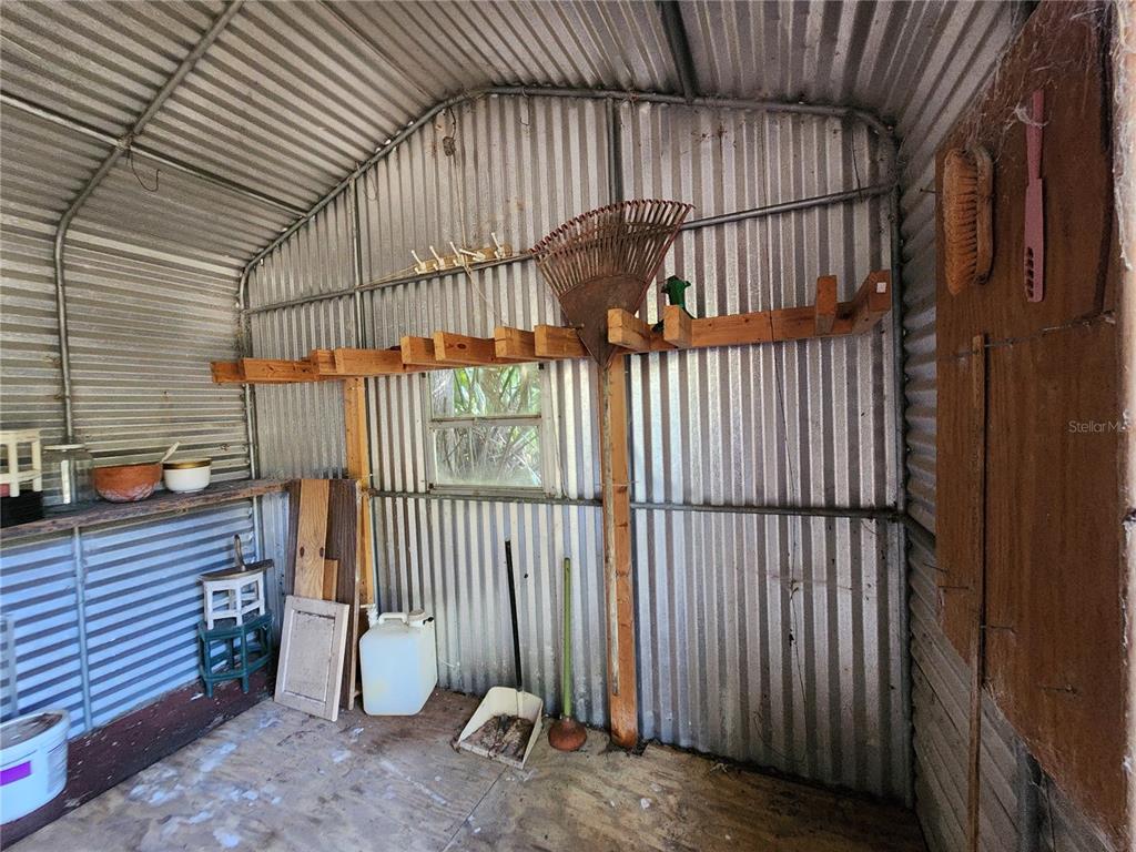 13022 East Shawnee Trail Inverness, FL 34450 - Photo 59 of 80 a view of a backyard with a iron fence