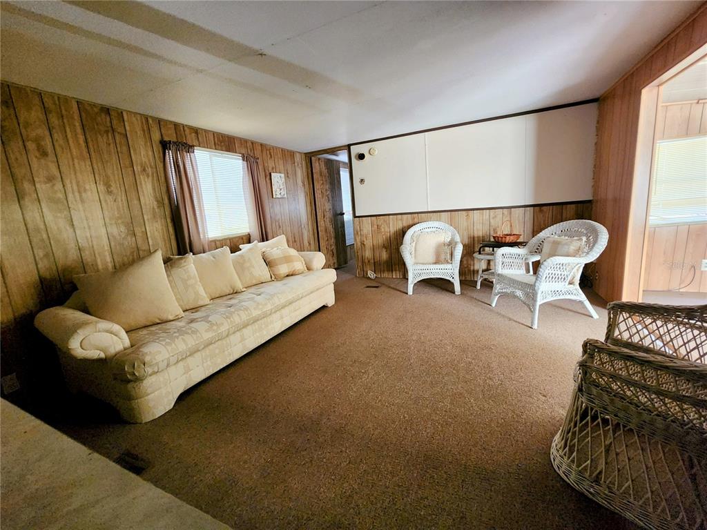 13022 East Shawnee Trail Inverness, FL 34450 - Photo 6 of 80 a living room with furniture and a window
