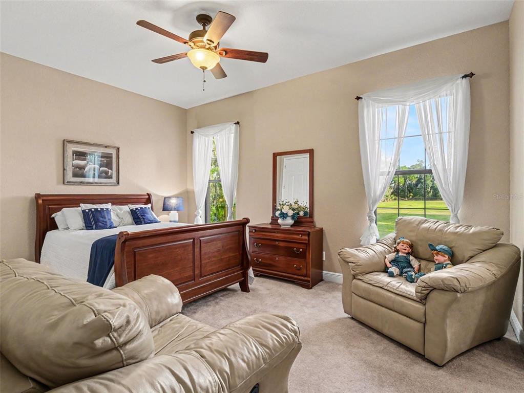 339 Corbett Road Lithia, FL 33547 - Photo 24 of 38 a living room with furniture and a large window
