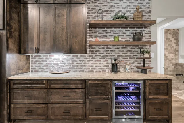 a kitchen with a sink and cabinets