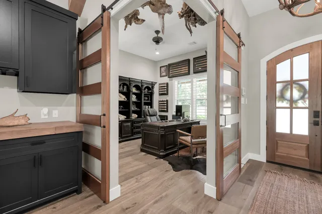 a kitchen with stainless steel appliances granite countertop a stove and a sink