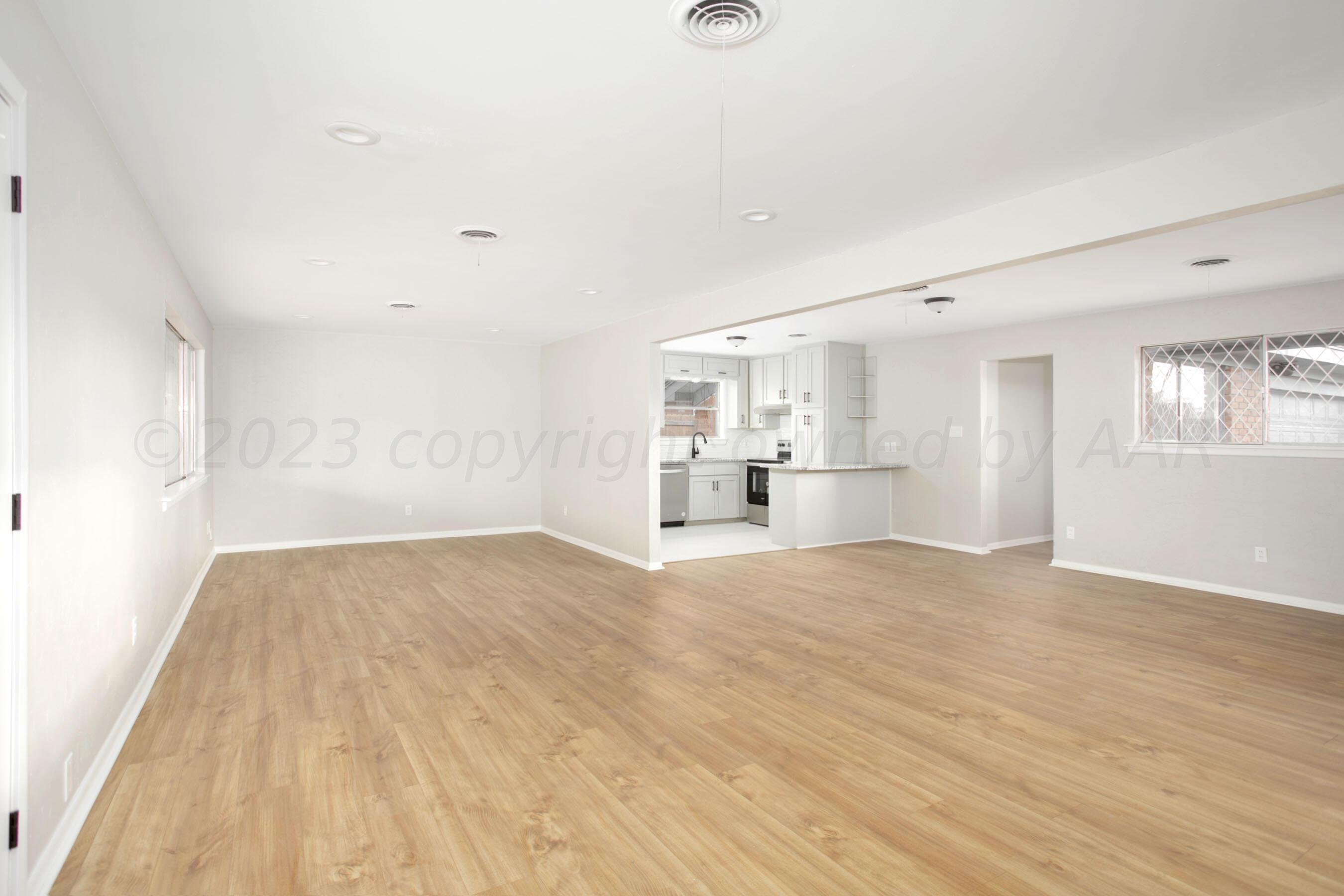3624 Sunlite Street Amarillo, TX 79109 - Photo 11 of 25 a view of empty room with wooden floor