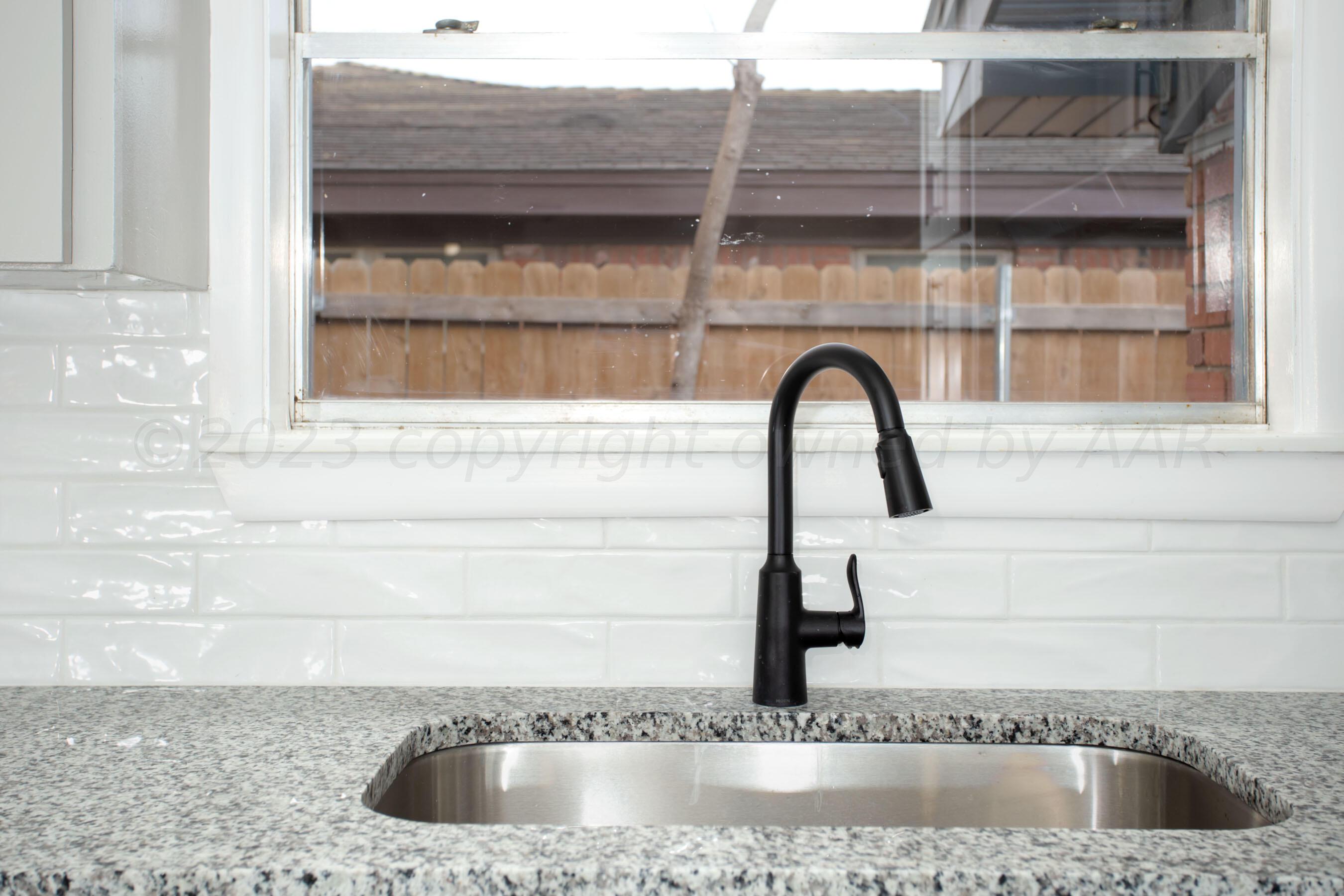 3624 Sunlite Street Amarillo, TX 79109 - Photo 5 of 25 a close view of a sink and a window