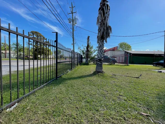 a view of a garden with a houses