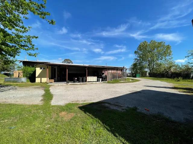 a view of swimming pool with seating area