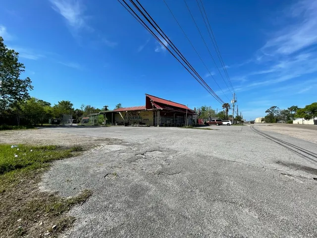 a view of a road with a yard