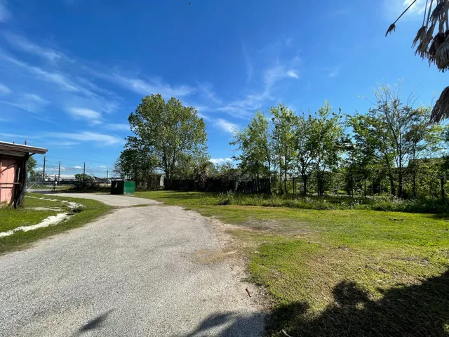 a view of a car parked in front of house