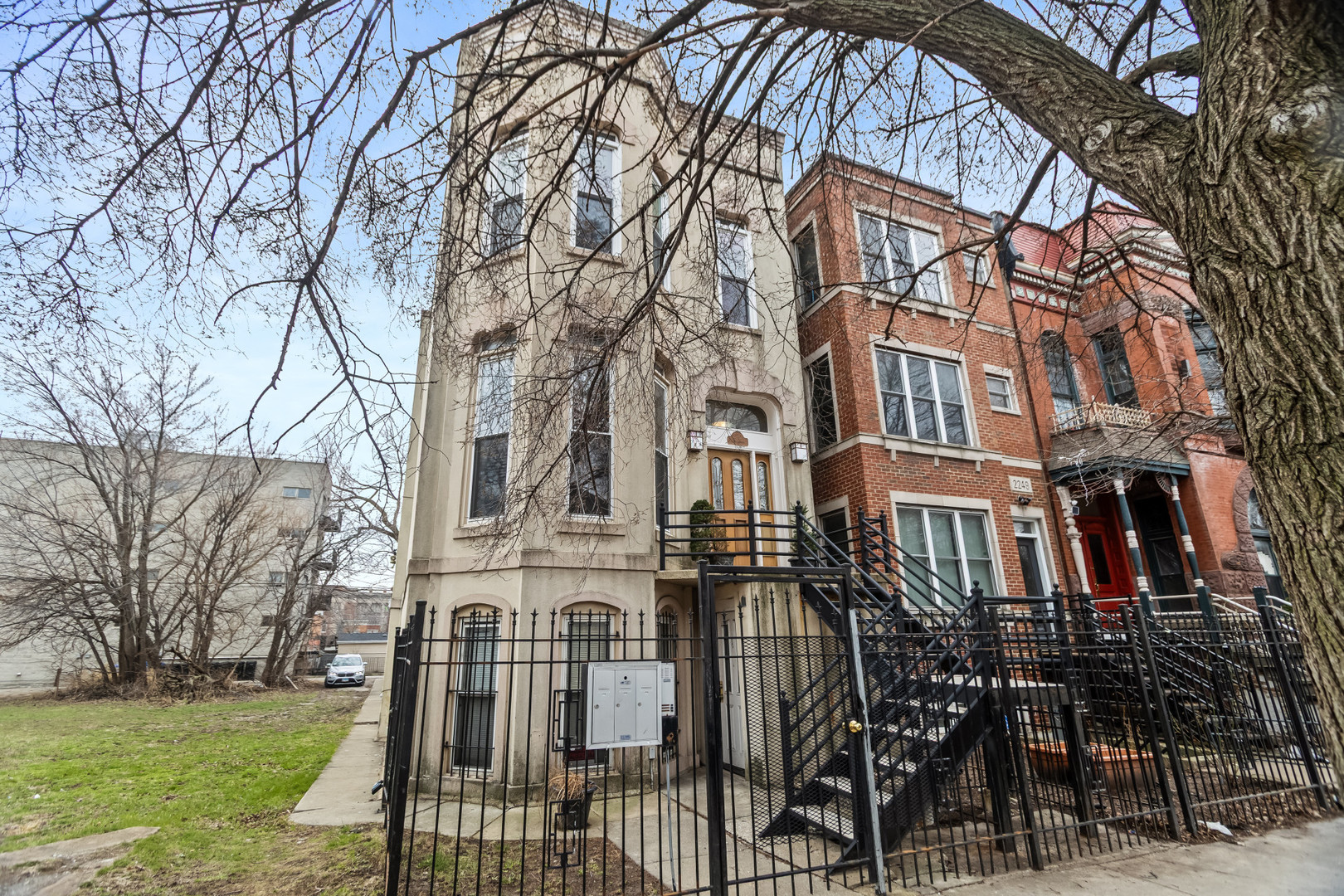 2247 West Monroe Street, Unit 3 Chicago, IL 60612 - Photo 1 of 31 a view of a building with a yard