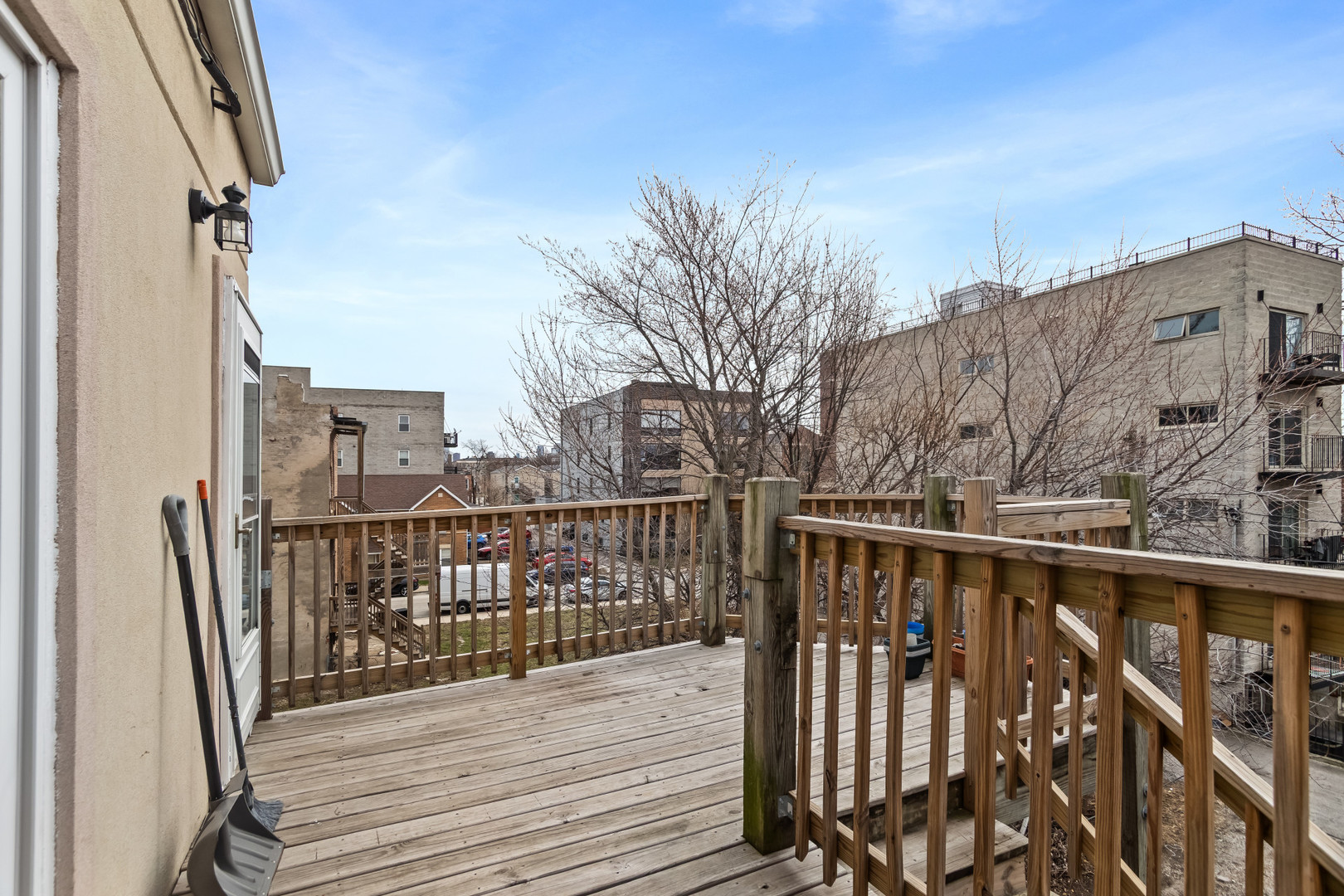 2247 West Monroe Street, Unit 3 Chicago, IL 60612 - Photo 16 of 31 a view of balcony with wooden floor and fence